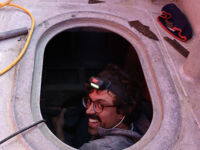 Garrett Binion, mate on the Free Reign, works on the vessel to prepare it for the season. May, 2024.